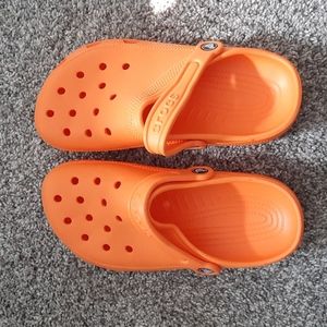 Brand new size 8 orange crocs